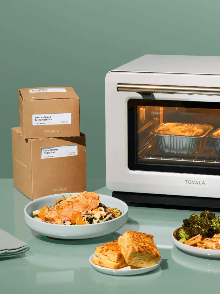 Image may contain: Box, Device, Appliance, Electrical Device, Microwave, Oven, Cooking, and Roasting