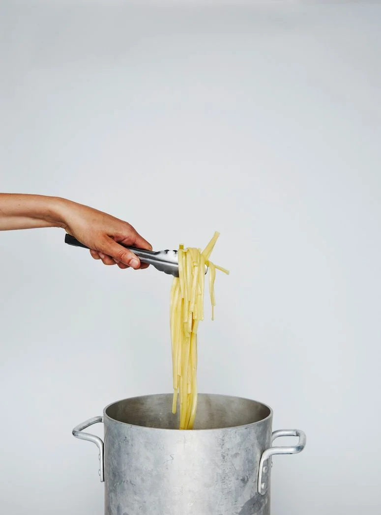 Image may contain: Human, Person, Food, Pasta, and Noodle