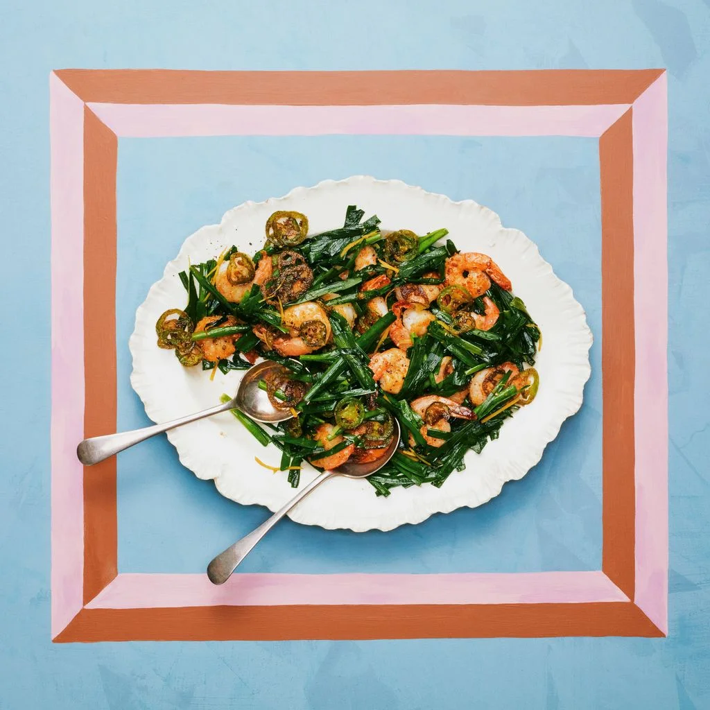 Shrimp Stir fry on a white plate placed on a blue background