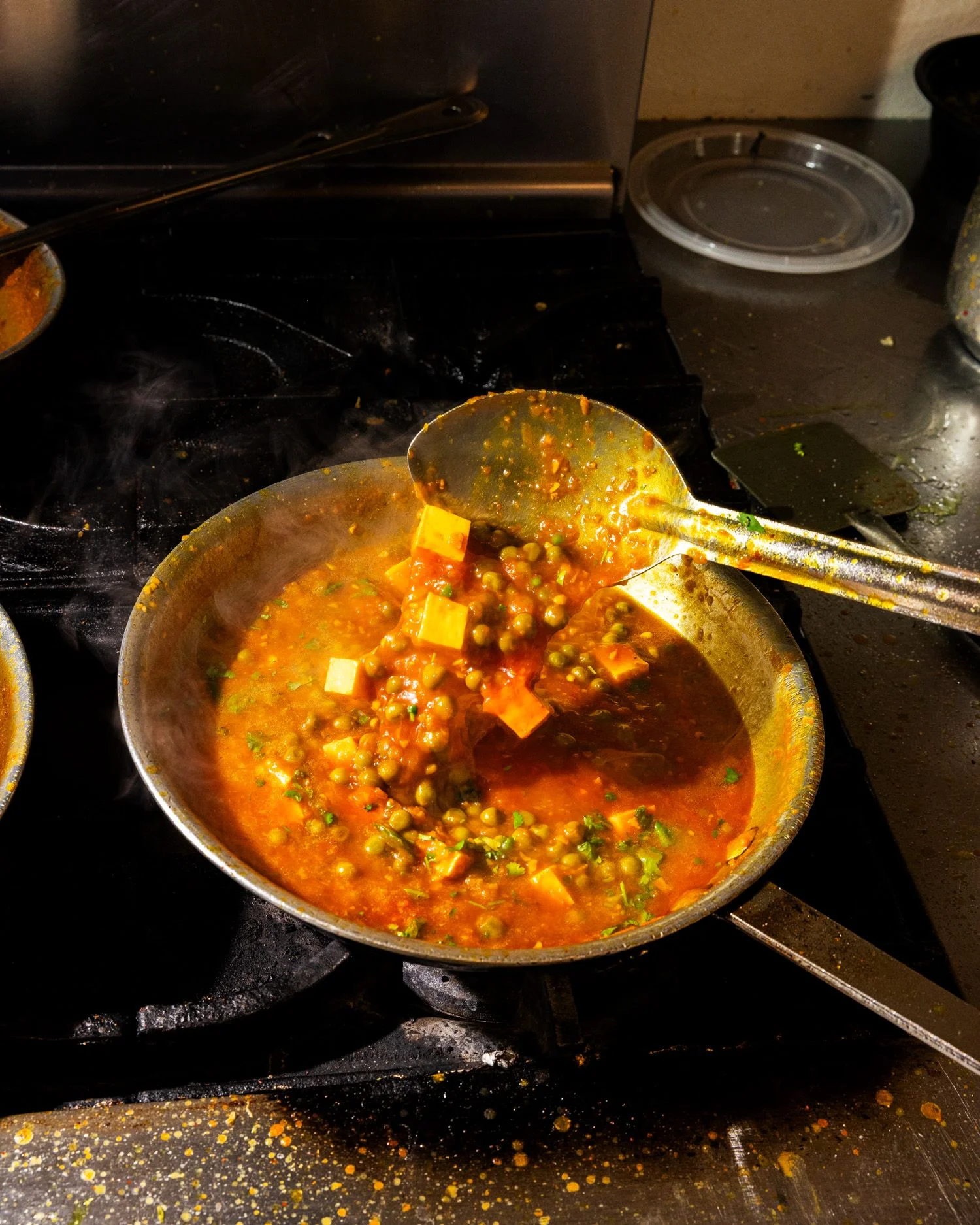 Image may contain Cooking Pan Cookware Curry Food and Plate