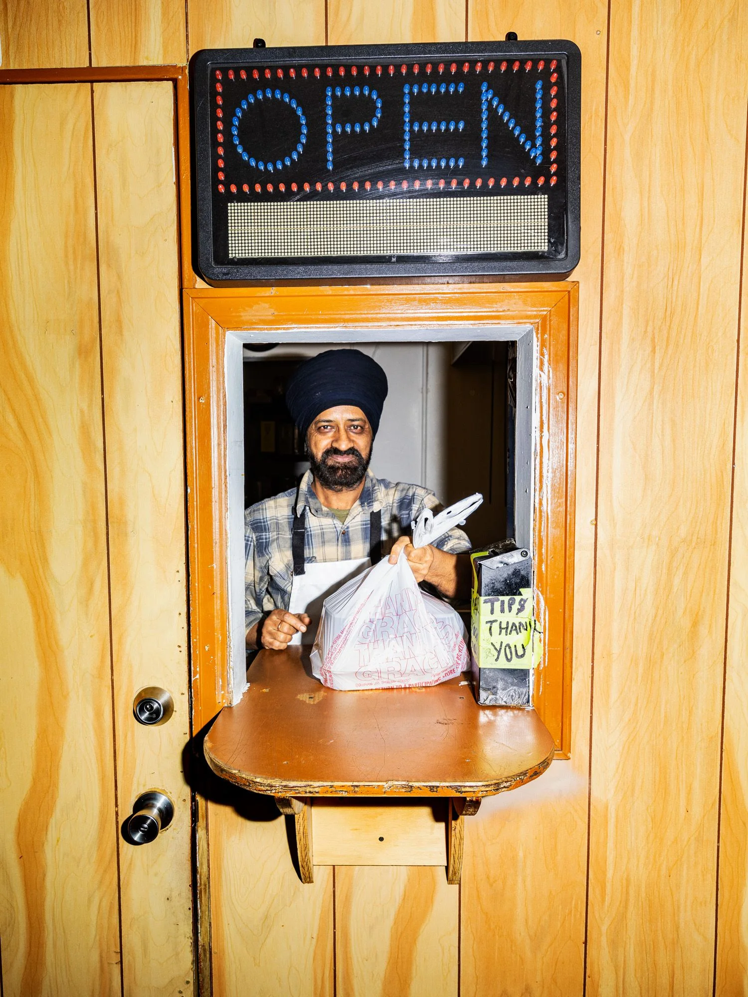 Image may contain Electronics Hardware Signage Restaurant Screen Face Head Person Photography and Portrait